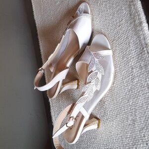 White heels with gold and silver leaf